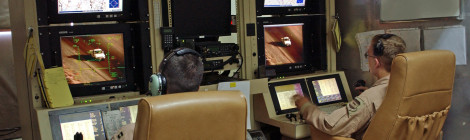 Capt. Richard Koll, left, and Airman 1st Class Mike Eulo perform function checks after launching an MQ-1 Predator unmanned aerial vehicle Aug. 7 at Balad Air Base, Iraq. Captain Koll, the pilot, and Airman Eulo, the sensor operator, will handle the Predator in a radius of approximately 25 miles around the base before handing it off to personnel stationed in the United States to continue its mission. Both are assigned to the 46th Expeditionary Reconnaissance Squadron. https://en.wikipedia.org/wiki/General_Atomics_MQ-1_Predator#/media/File:MQ-1_Predator_controls_2007-08-07.jpg