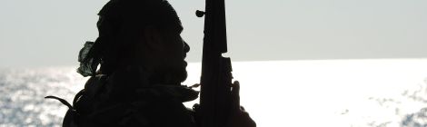 Pakistan_Navy_Special_Service_Group_member_silhouetted_aboard_Pakistan_Navy_Ship_PNS_Babur