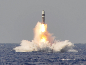 140602-N-ZZ999-202 ATLANTIC OCEAN (June 2, 2014) A trident II D-5 ballistic missile is launched from the Ohio-class ballistic missile submarine USS West Virginia (SSBN 736) during a missile test at the Atlantic Missile Range. The test flights were part of a demonstration and shakedown operation, which the Navy uses to certify a submarine for deployment after a major overhaul. The missiles were converted into test configurations with kits containing range safety devices and flight telemetry instrumentation. The U.S. Navy supports U.S. Strategic Command's strategic deterrence missions by operating and maintaining Ohio-class ballistic missile submarines to deter regional and strategic threats. The triad, the U.S. strategic nuclear forces of ICBMs, bombers, and ballistic missile submarines, remains the primary deterrent of nuclear attacks against the U.S., our allies, and partners. (U.S. Navy photo/Released)