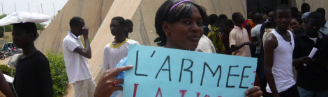"The Army: National Shame" caption held by protester in Mali against the 2012 coup. Source: Wikipedia