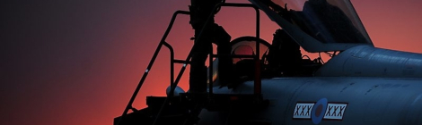 A Royal Air Force Typhoon pilot enters the cockpit as the sun sets over Gioia del Colle, southern Italy. As RAF Typhoon aircraft play a greater part in deliberate targeting operations, where targets are pre-planned, more are carrying four of the 1000lb Enhanced Paveway II bombs. The aircraft's ability to use its Litening III targeting pod to direct the highly accurate bombs means that a single Typhoon can have a devastating effect on Qadhafi regime targets. This image is available for non-commercial, high resolution download at www.defenceimages.mod.uk subject to terms and conditions. Search for image number 45152844.jpg ---------------------------------------------------------------------------- Photographer: Sgt Pete Mobbs Image 45152844.jpg from www.defenceimages.mod.uk